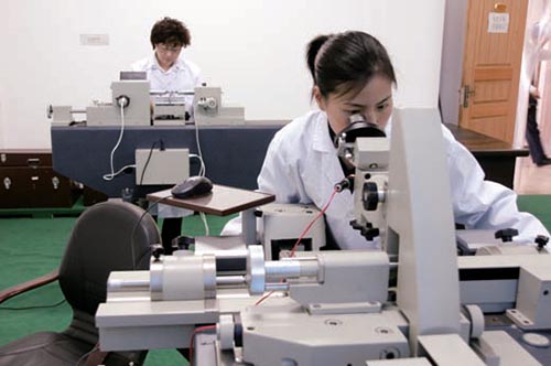 Microscopio multi-uso y telémetro con proyección de 1 metro